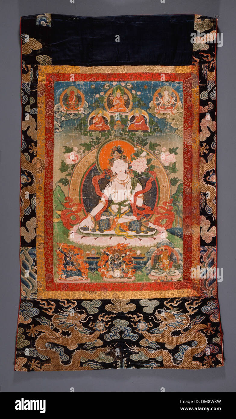 Cette œuvre représente White Tara, une déesse bouddhiste connue pour sa guérison et sa nature compatissante. La peinture est un exemple de l’art bouddhiste traditionnel, mettant en valeur l’expression sereine et le symbolisme spirituel de la déesse dans l’iconographie orientale. Banque D'Images