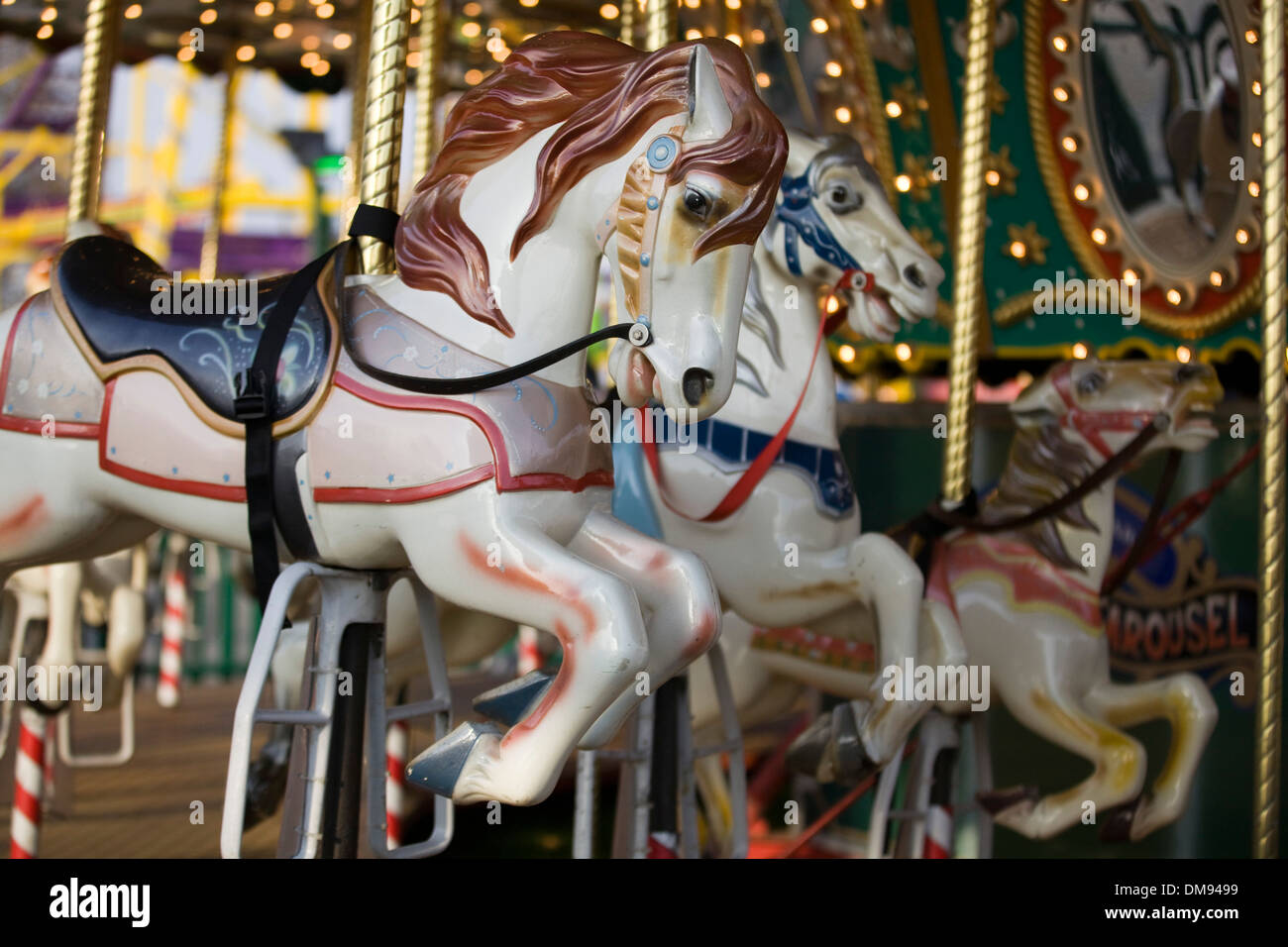 Les chevaux au galop de foire traditionnelle ride Banque D'Images