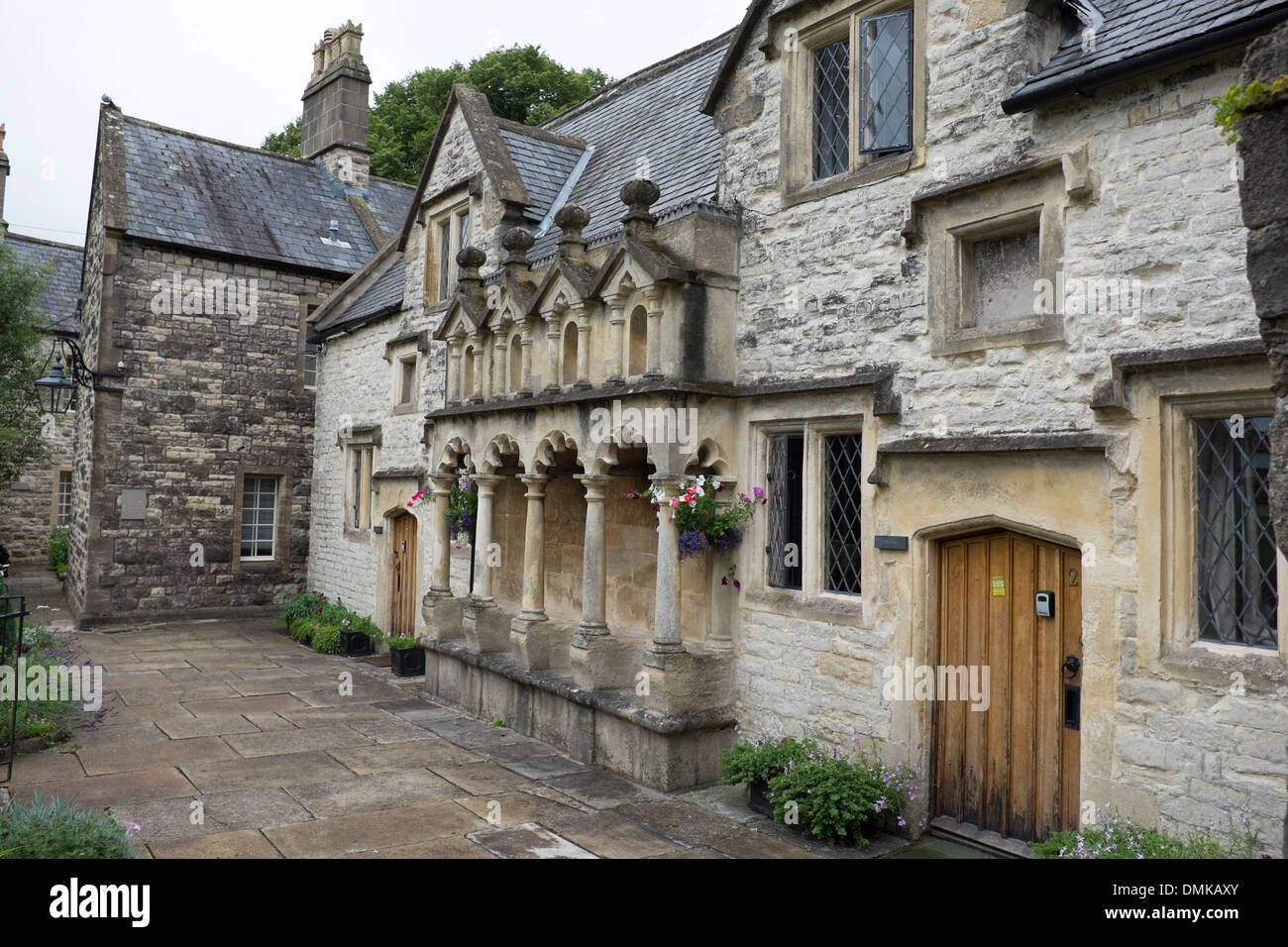 L'aumône de maisons dans la ville de Wells UK Banque D'Images