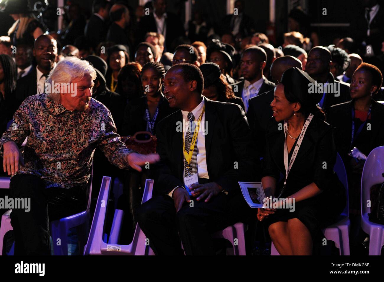 Qunu, Afrique du Sud. Le 15 décembre 2013. Richard Brenson, Patrice Motsepe et sa femme Makgosi précieux au cours de la Molo Madiba funérailles nationales le 15 décembre 2013 à Qunu, Afrique du Sud. Nelson Mandela est décédé dans la soirée du 5 décembre 2013 à son domicile. Il est inhumé au sa ferme à Qunu lors des funérailles d'État. (Photo par Gallo Images / Photos / Felix24 Dlangamandla) Credit : Gallo images/Alamy Live News Banque D'Images