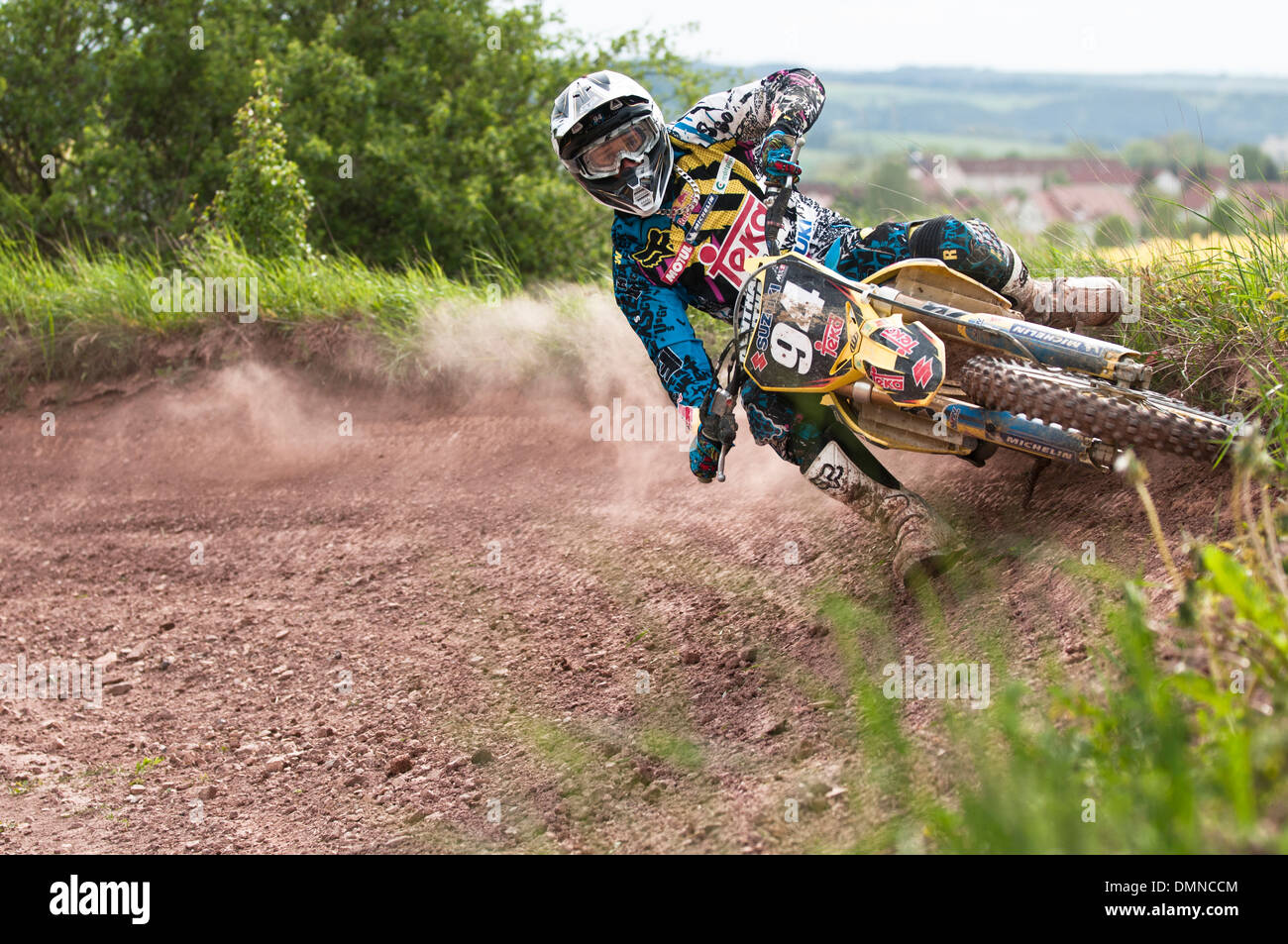 Motocross rider sur une piste de course Banque D'Images
