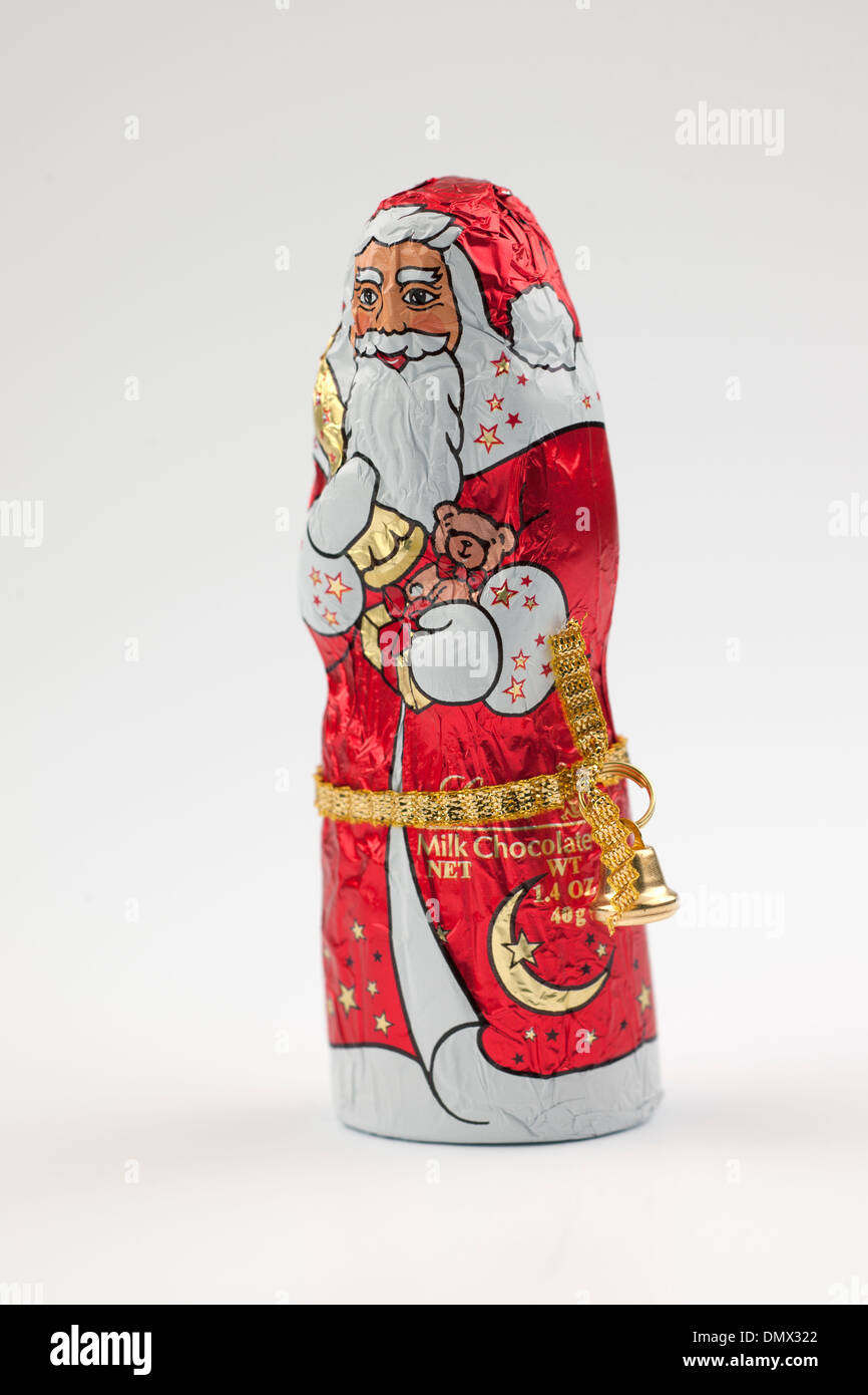 Père Noël en chocolat au lait d'aluminium Banque D'Images