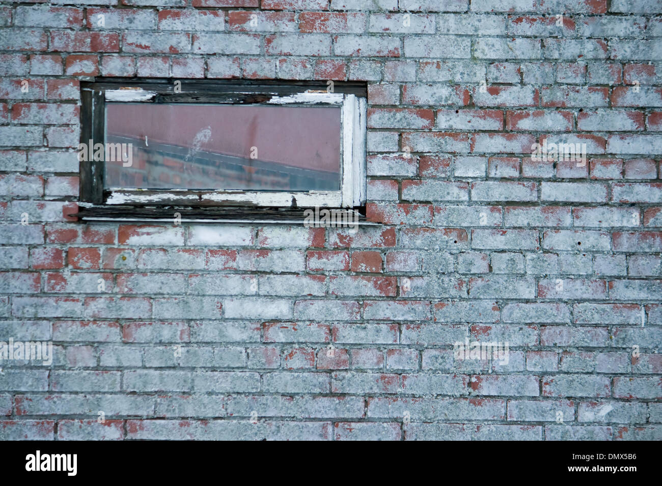 Dans le cadre de la glace pourrie brick wall Banque D'Images