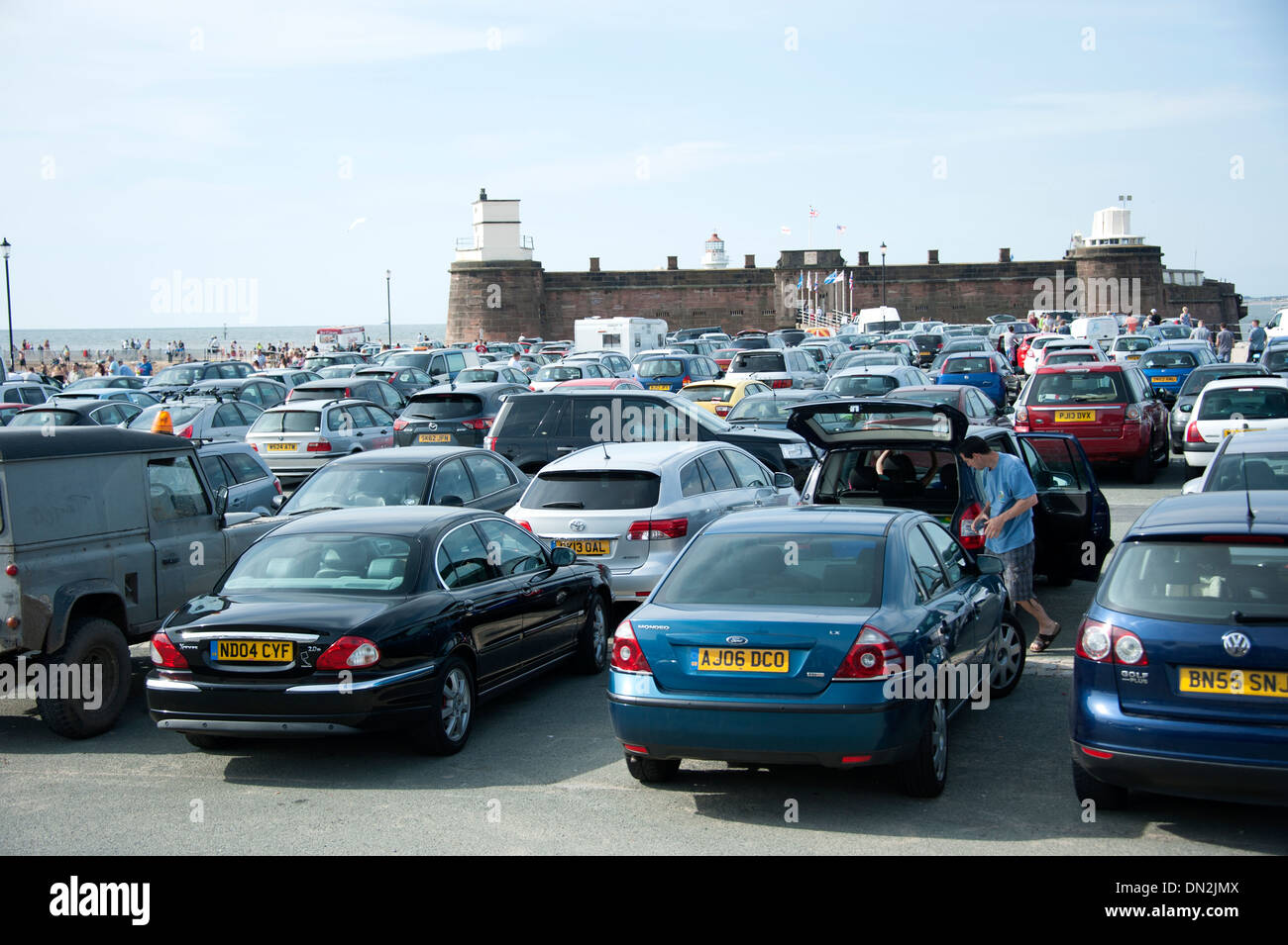 Pleine mer parking occupé beach New Brighton Banque D'Images