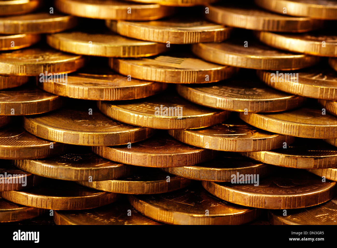 Des tas de pièces d'or texture close up Banque D'Images