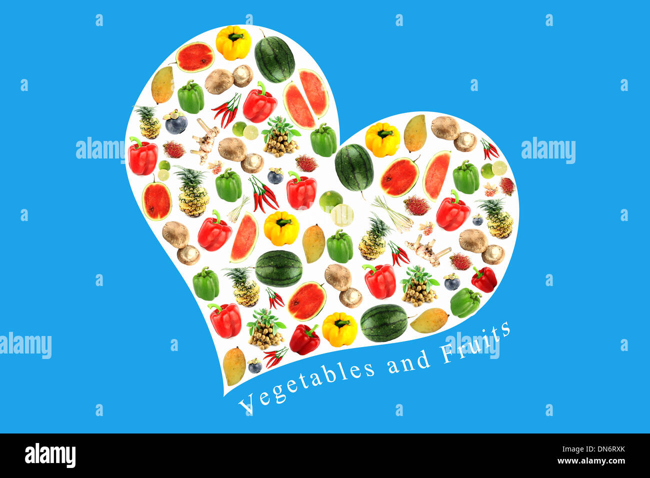 Les légumes et fruits sur un coeur blanc,il reflète l'amour et les soins de manger de la bonne nourriture. Banque D'Images