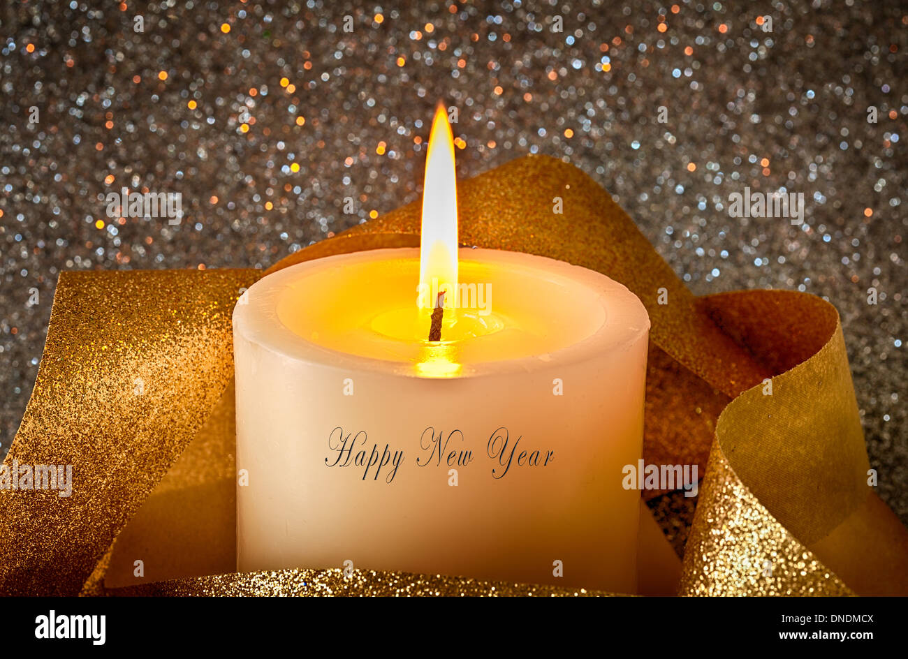 Bougie avec paillettes et l'or, et Happy New Year Banque D'Images