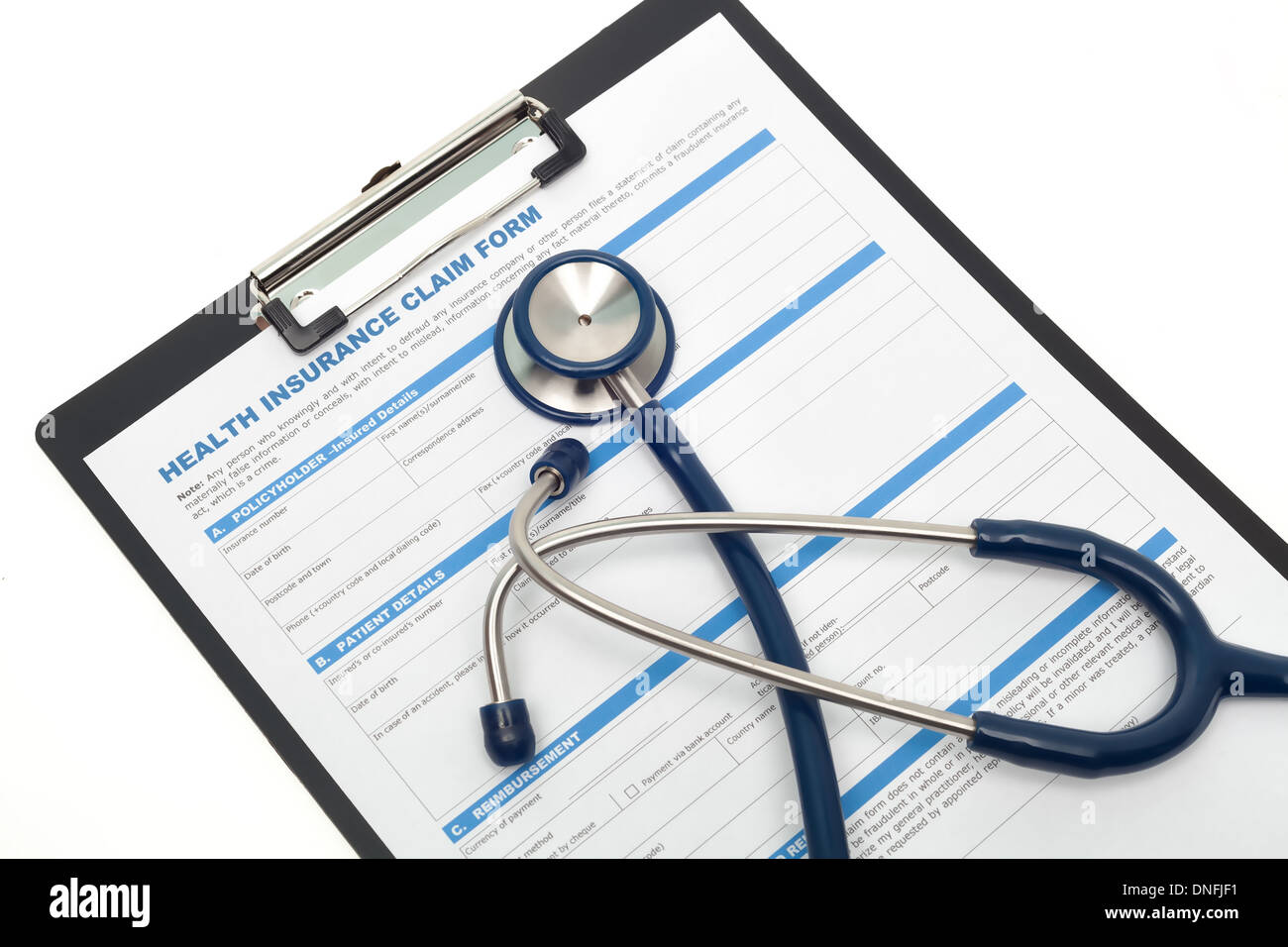 De la médecine et de la santé Formulaire de réclamation d'assurance avec stéthoscope isolé dans le presse-papiers Banque D'Images