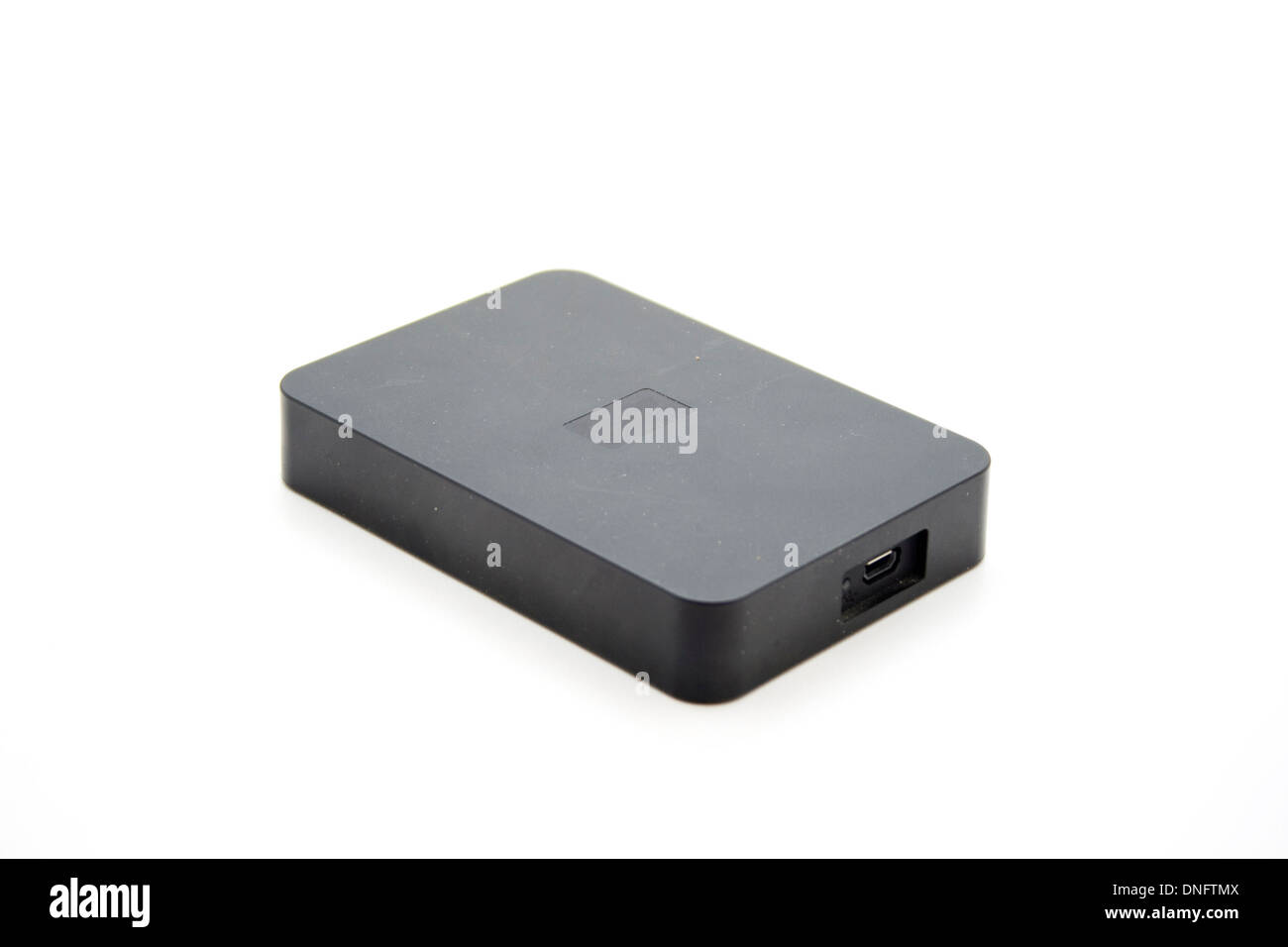 Disque dur Disque dur externe noir sur fond blanc Banque D'Images