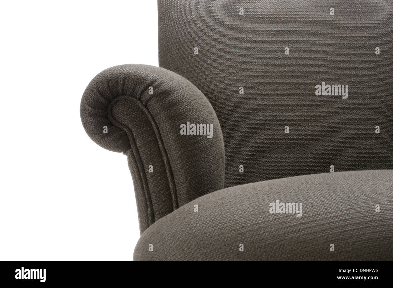 Une section d'un confortable canapé gris mobilier de la table. Banque D'Images