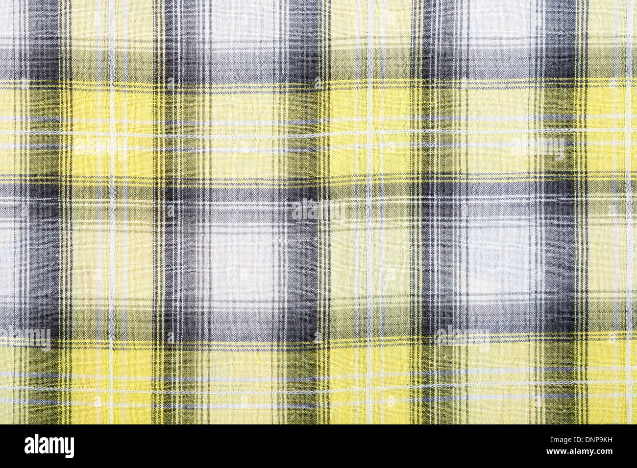 La matière dans un jaune et gris, une grille de fond textile. Banque D'Images