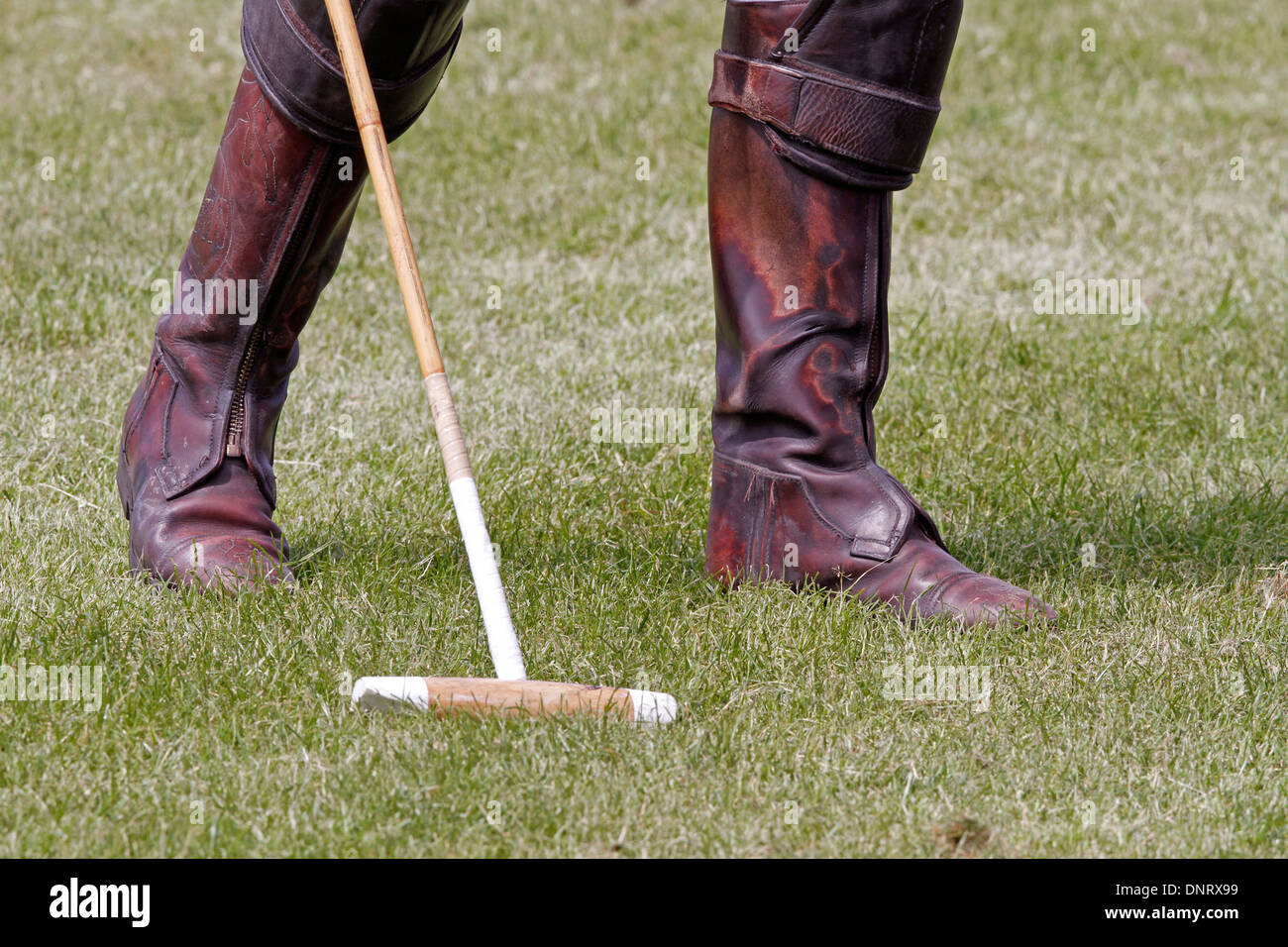 Les jambes d'un joueur de polo polo avec ballet Banque D'Images