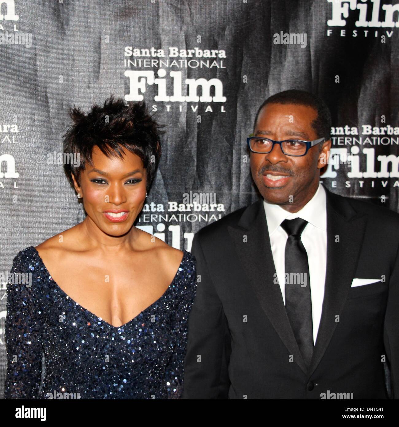 Santa Barbara, Californie, USA - 5 janvier 2014. Le tapis rouge pour les arrivées de Santa Barbara International Film Festival's Kirk Douglas Award for Excellence in film présenté à Forest Whitaker à un noir de gala tenu à la Bacara Resort & Spa. Photo : Angela Bassett avec son mari Courtney B. Vance. Credit : Lisa Werner/Alamy Live News Banque D'Images