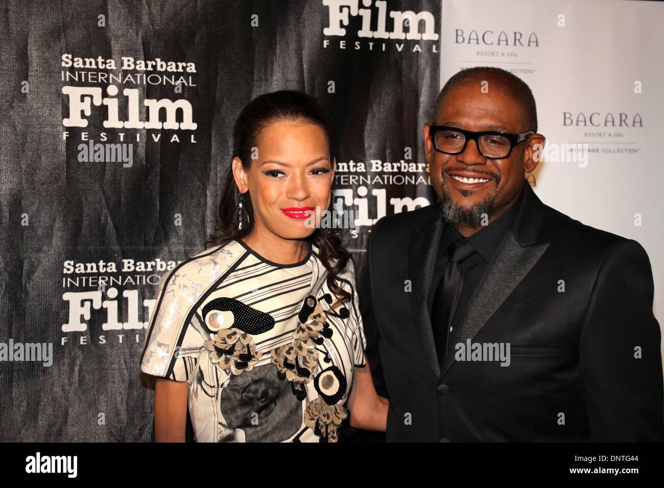 Santa Barbara, Californie, USA - 5 janvier 2014. Le tapis rouge pour les arrivées de Santa Barbara International Film Festival's Kirk Douglas Award for Excellence in film présenté à Forest Whitaker à un black tie gala tenu à la Bacara Resort & Spa. Photo : Forest Whitaker avec sa femme Keisha. Credit : Lisa Werner/Alamy Live News Banque D'Images