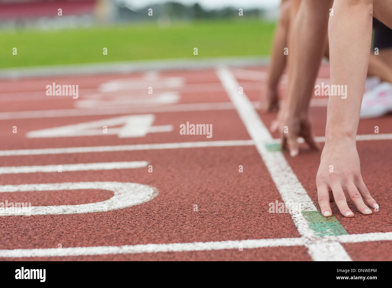 Les gens cultivés prêts pour la course sur piste Banque D'Images