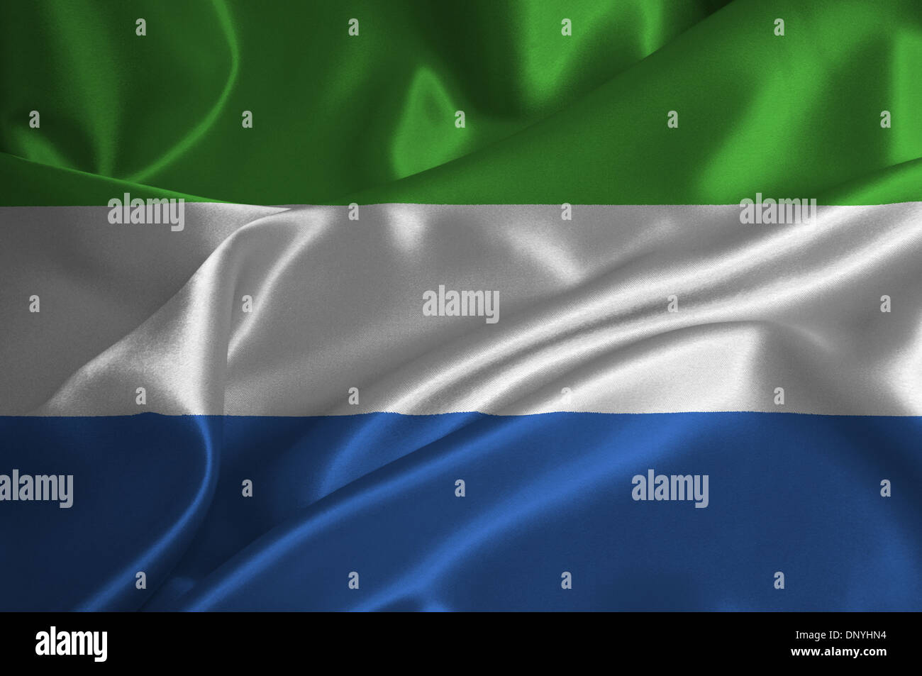 Siera Leone drapeau sur la finition satinée. Banque D'Images