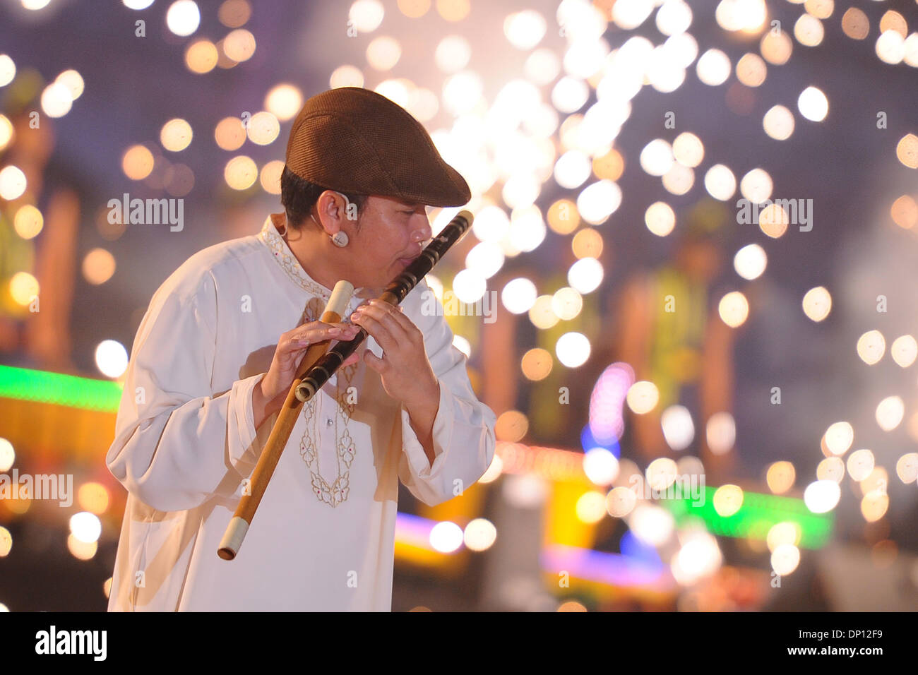 Kuala Lumpur, MYS, . 4 janvier, 2014. Un pied piper effectue durant le grand lancement de la campagne 2014 pour visiter la Malaisie à Kuala Lumpur, Malaisie, samedi, le 4 janvier 2014. Visitez la Malaisie Année 2014 débute samedi, le 4 janvier pour former une campagne de 28 millions de touristes à courtiser le pays cette année. © Joshua Paul/NurPhoto ZUMAPRESS.com/Alamy/Live News Banque D'Images