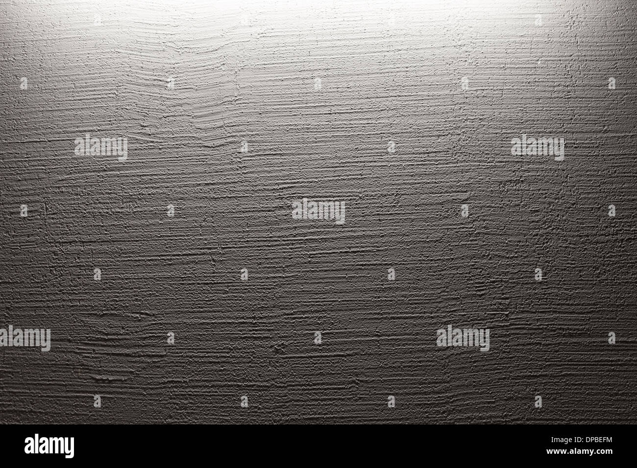 Reliefs en stuc blanc décoratif mur avec illumination forte Banque D'Images