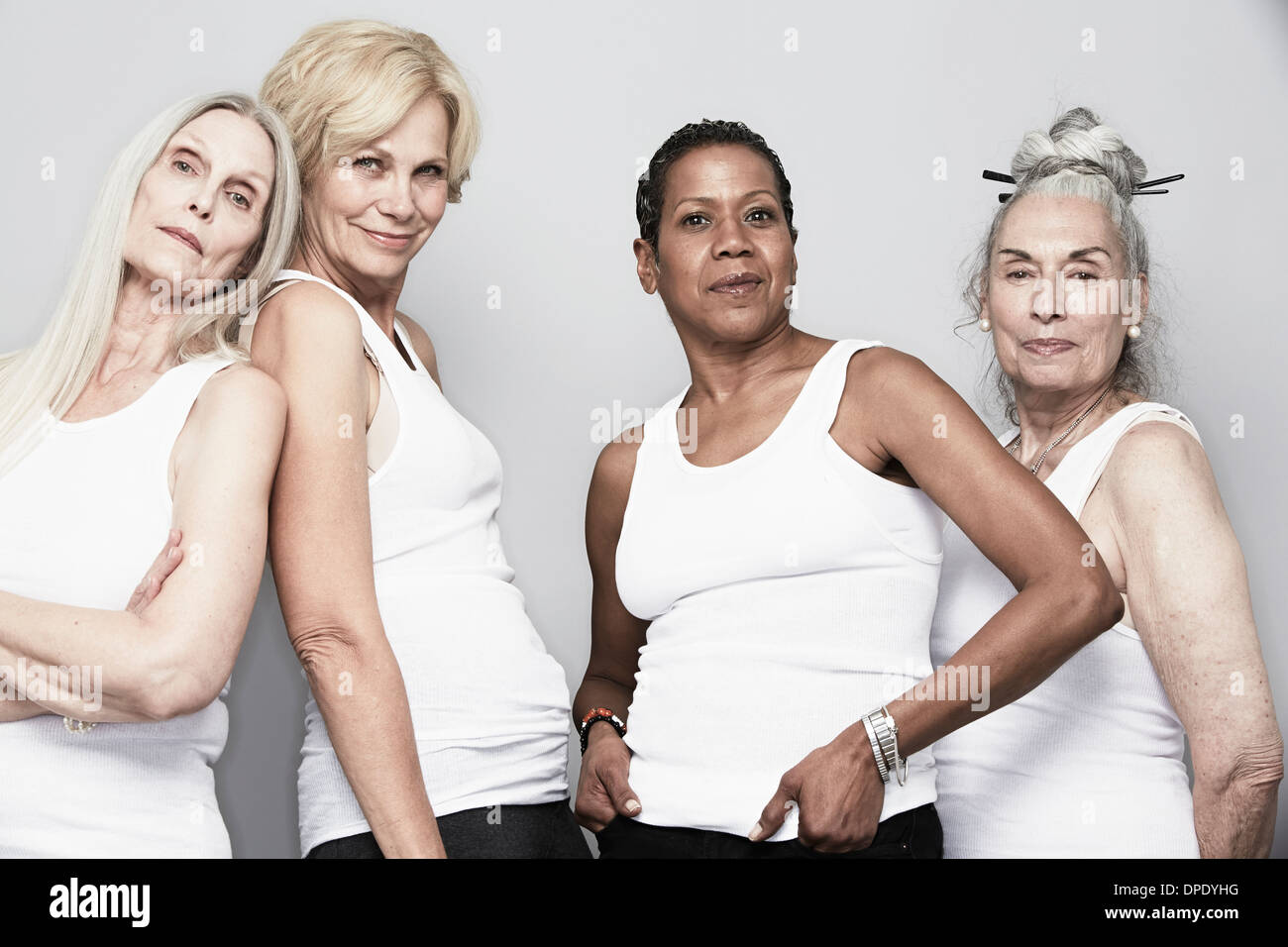 Studio portrait of senior women friends posing for camera Banque D'Images