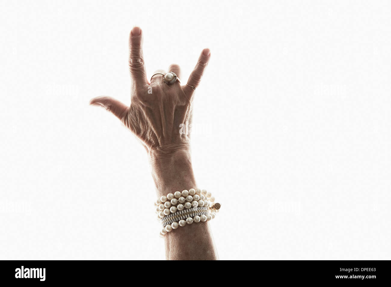 Studio shot of young woman's hand geste décisionnel Banque D'Images