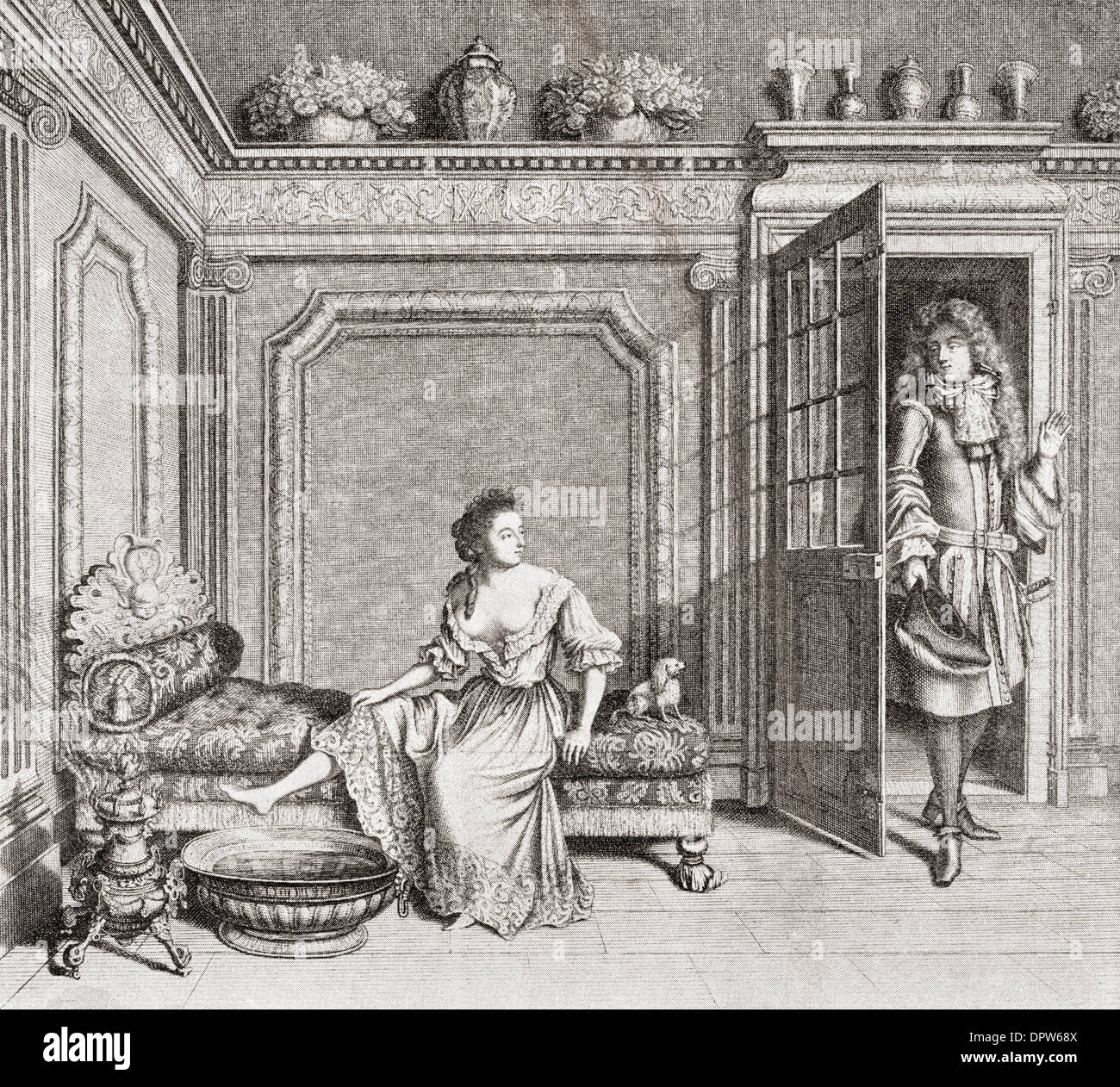 Une dame du 18ème siècle en prenant un bain de pieds est interrompu par un prétendant. Banque D'Images
