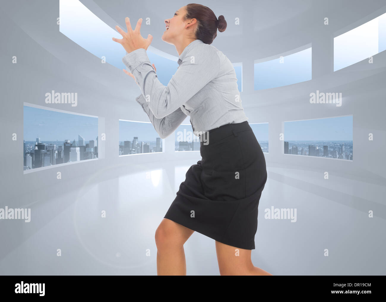 Composite image of businesswoman gesturing Banque D'Images