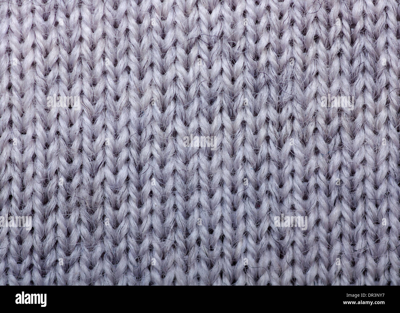 Détail de macro texture laine tricoté gris ou l'arrière-plan Banque D'Images