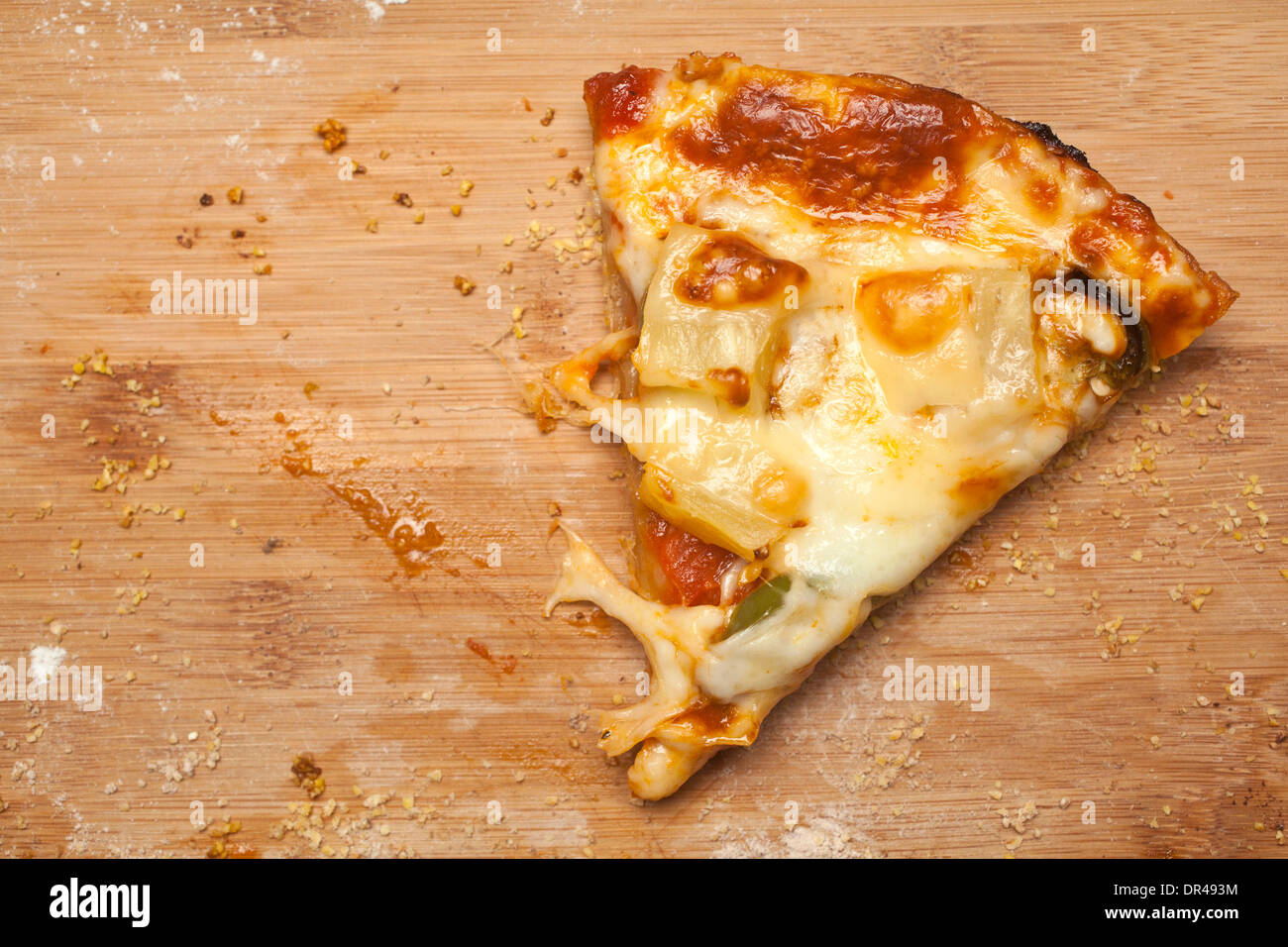 Dernière tranche de fromage pizza Banque D'Images