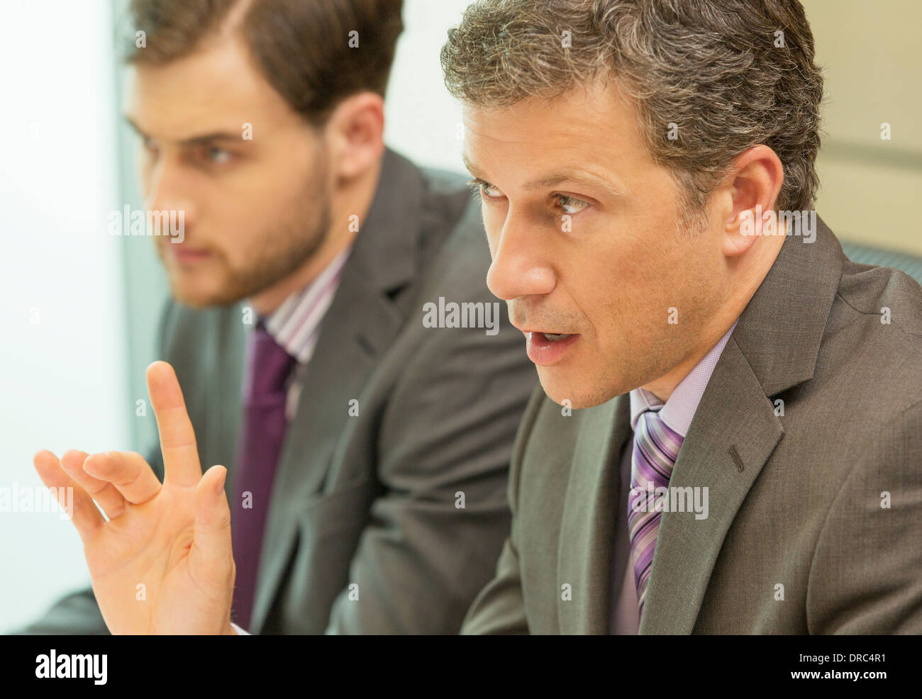 Businessman talking in meeting Banque D'Images