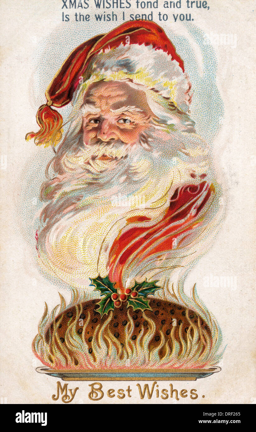 Le Père Noël et un pudding Banque D'Images