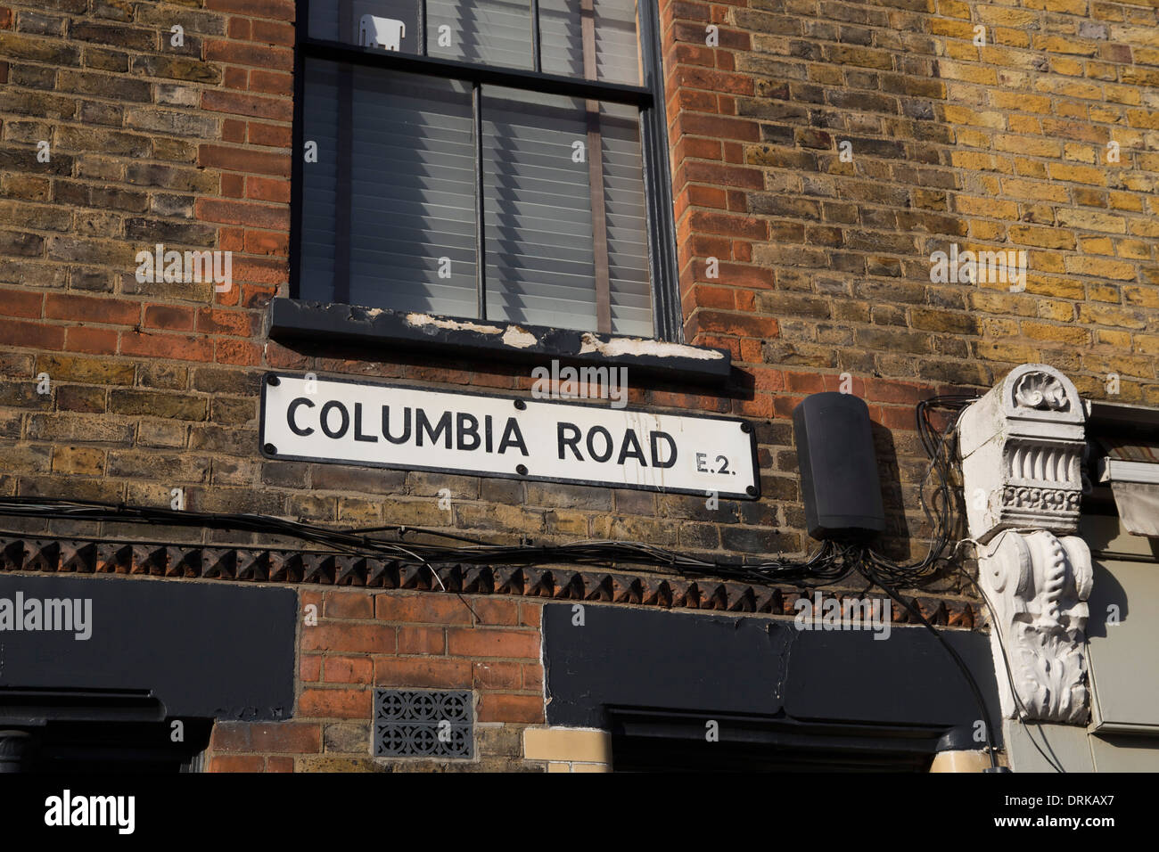 Columbia Road, E2, signe de route sur mur. Banque D'Images