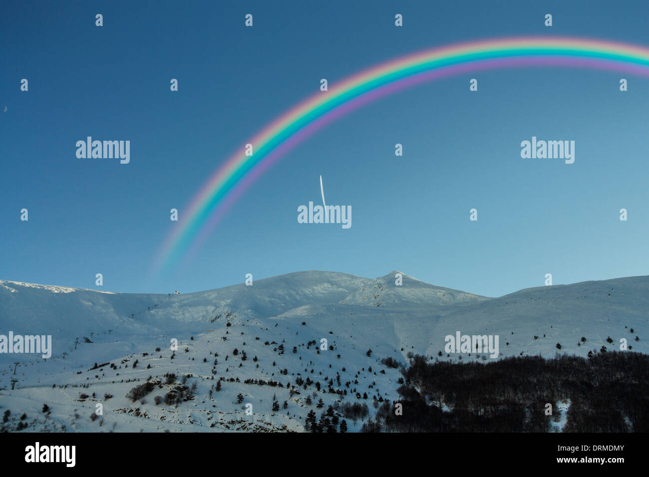 Arc-en-ciel dans les Snowy Mountains Banque D'Images