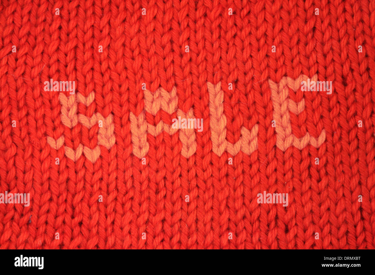 Concept de vente d'hiver tricoté rouge contexte close up Banque D'Images