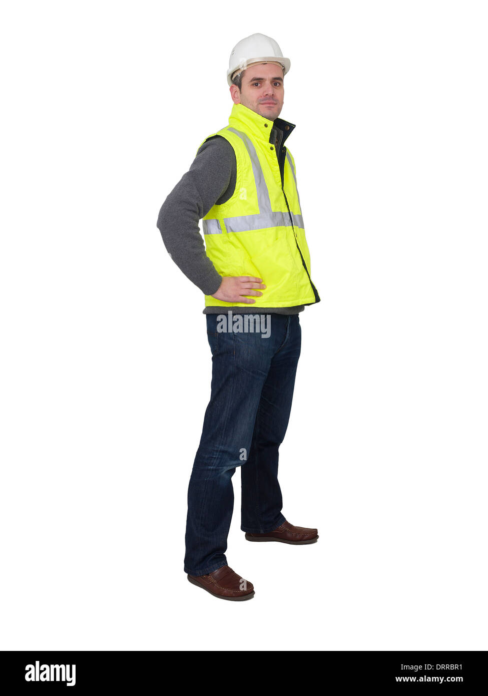 Portrait en pied de l'ingénieur avec casque et gilet de sécurité réfléchissant jaune Banque D'Images