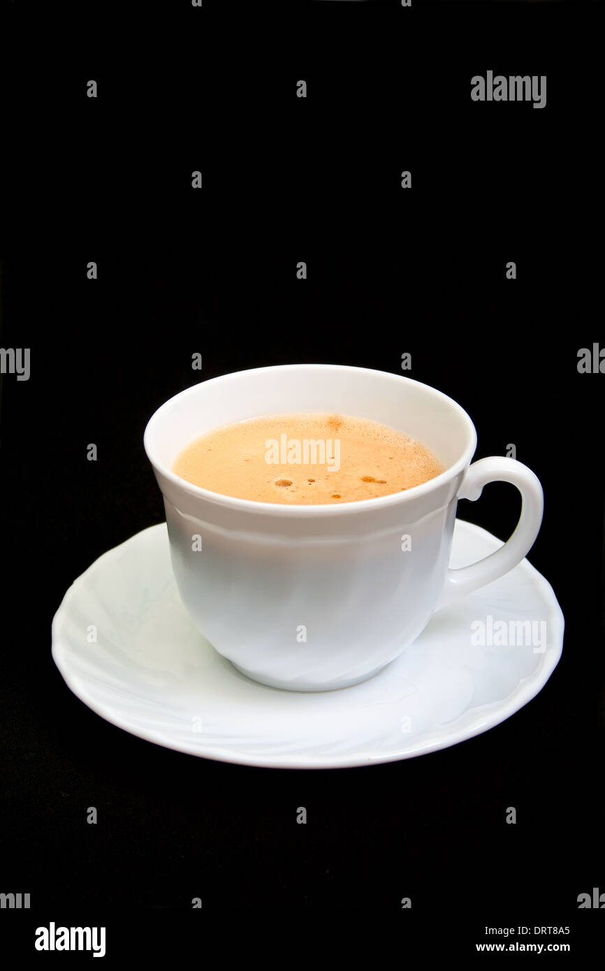 Tasse de café avec l'écume. Banque D'Images