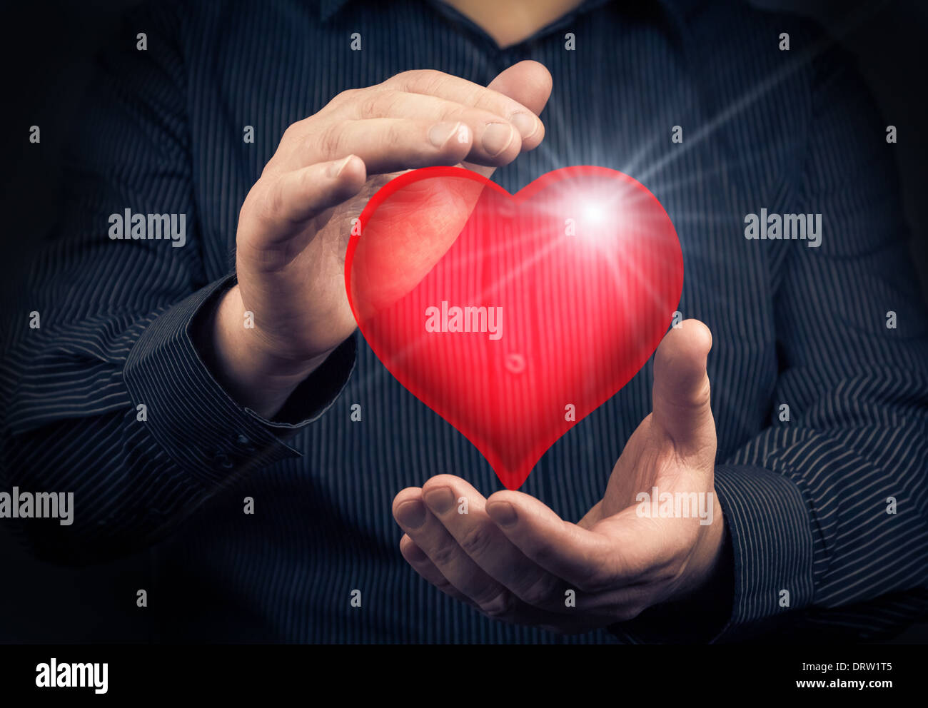 Valentine entre les mains d'un homme Banque D'Images