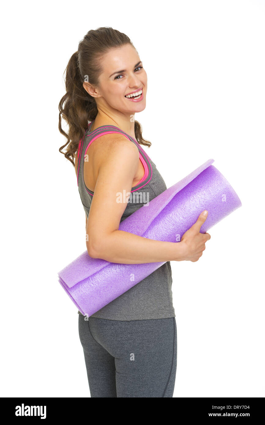 Portrait of happy young woman with fitness Tapis de fitness Banque D'Images