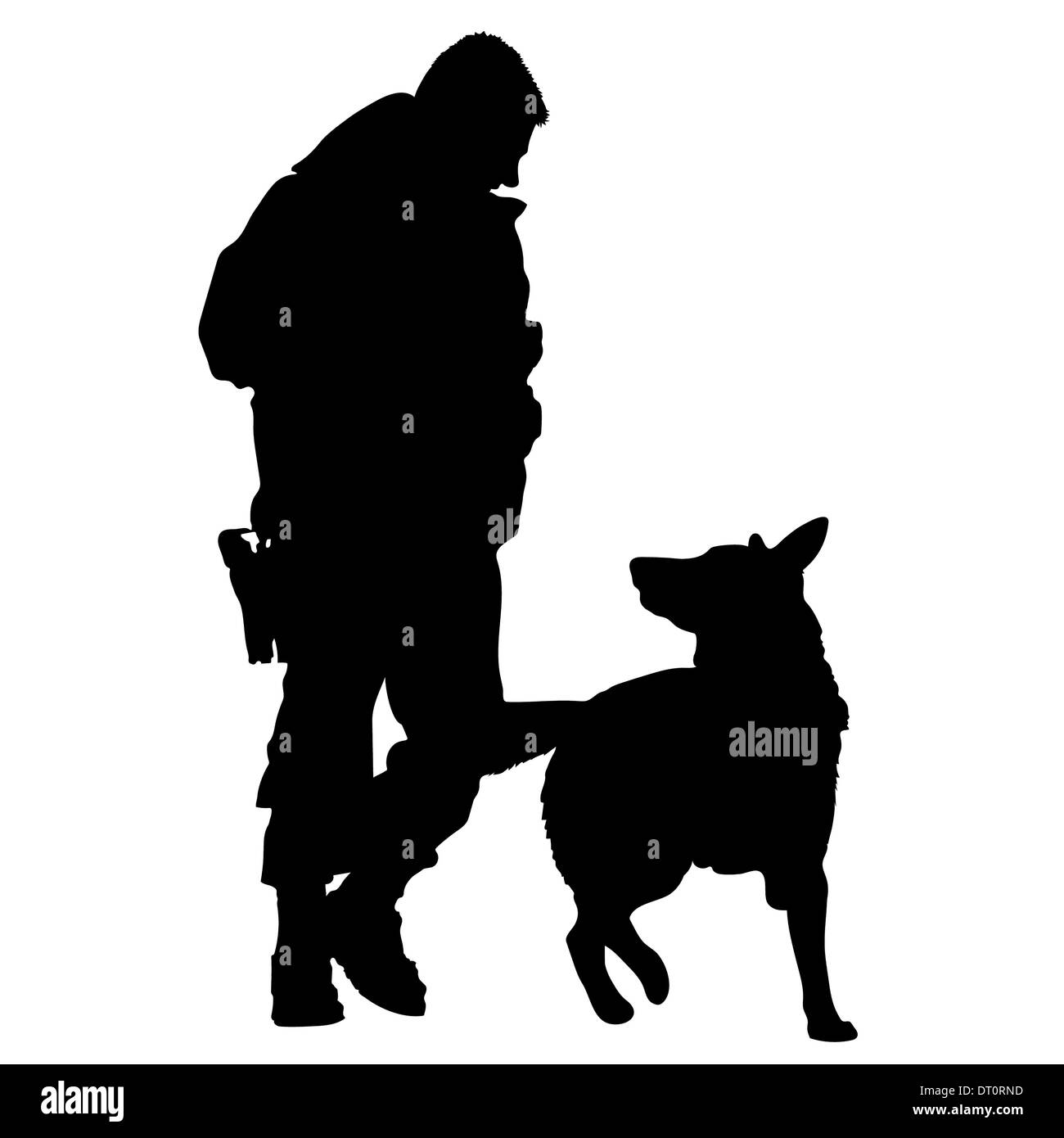 Silhouette d'un policier avec son partenaire de formation de chien Banque D'Images