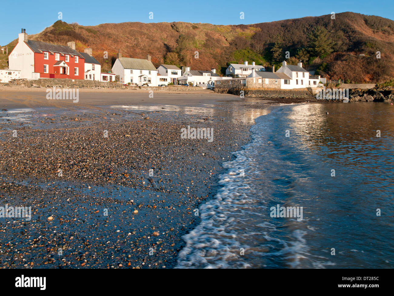 La première lumière à Porthdinllaen, Péninsule de Lleyn, Gwynedd, au nord du Pays de Galles, Royaume-Uni Banque D'Images