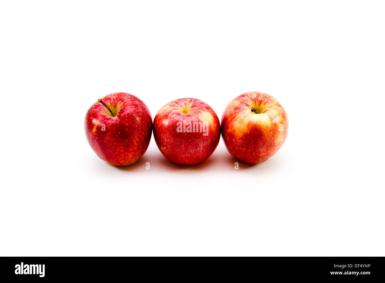 Des pommes rouges sur fond blanc Banque D'Images