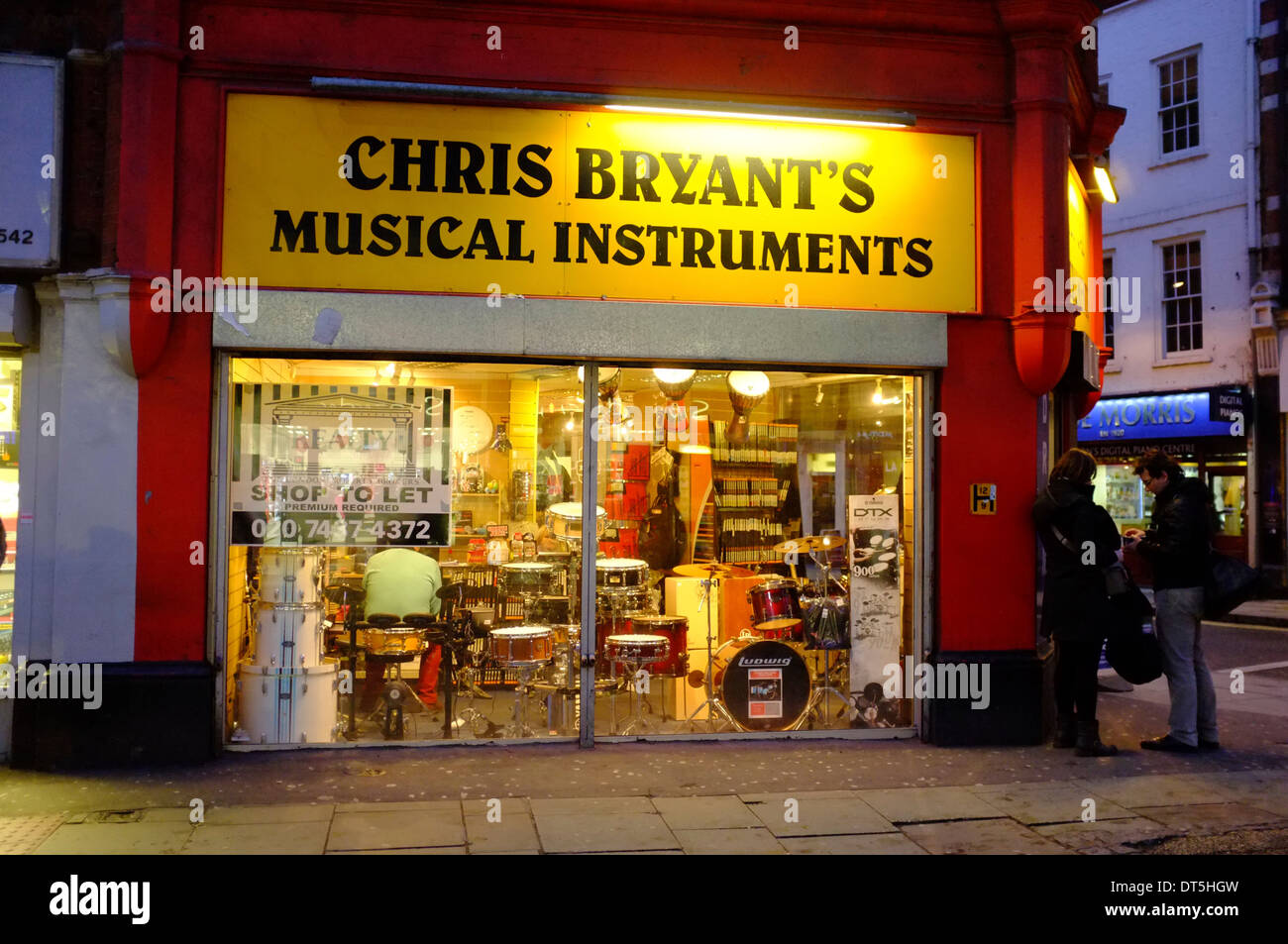 Chris Bryant's Musical Instruments boutique sur la carbonisation Cross Road, London Banque D'Images