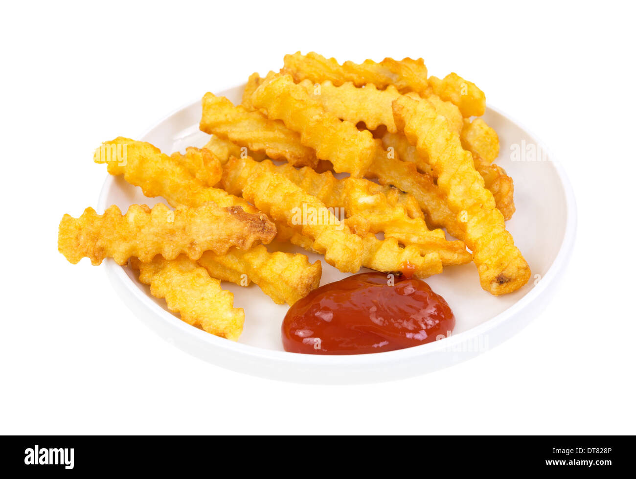 Une petite portion de frites dans un plat avec du ketchup. Banque D'Images