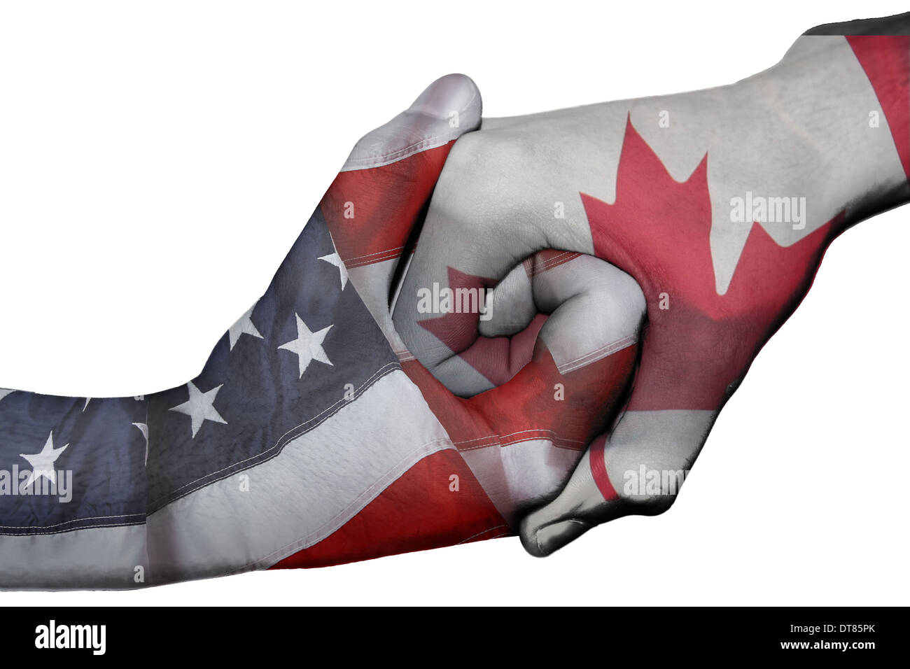 Poignée de main entre deux mains avec des drapeaux des Etats-Unis et du Canada Banque D'Images
