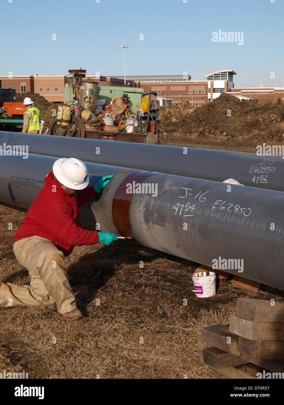 Les joints du tuyau de liaison Workman couture sections dans un pipeline pour acheminer le gaz naturel vers les marchés dans le domaine Barnett Banque D'Images