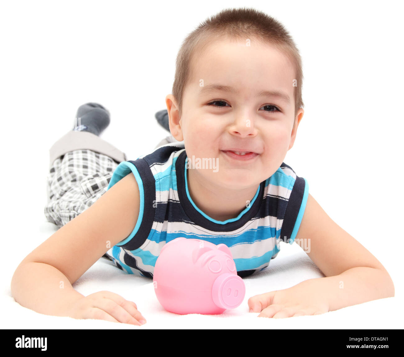 Heureux l'enfant avec piggy bank Banque D'Images