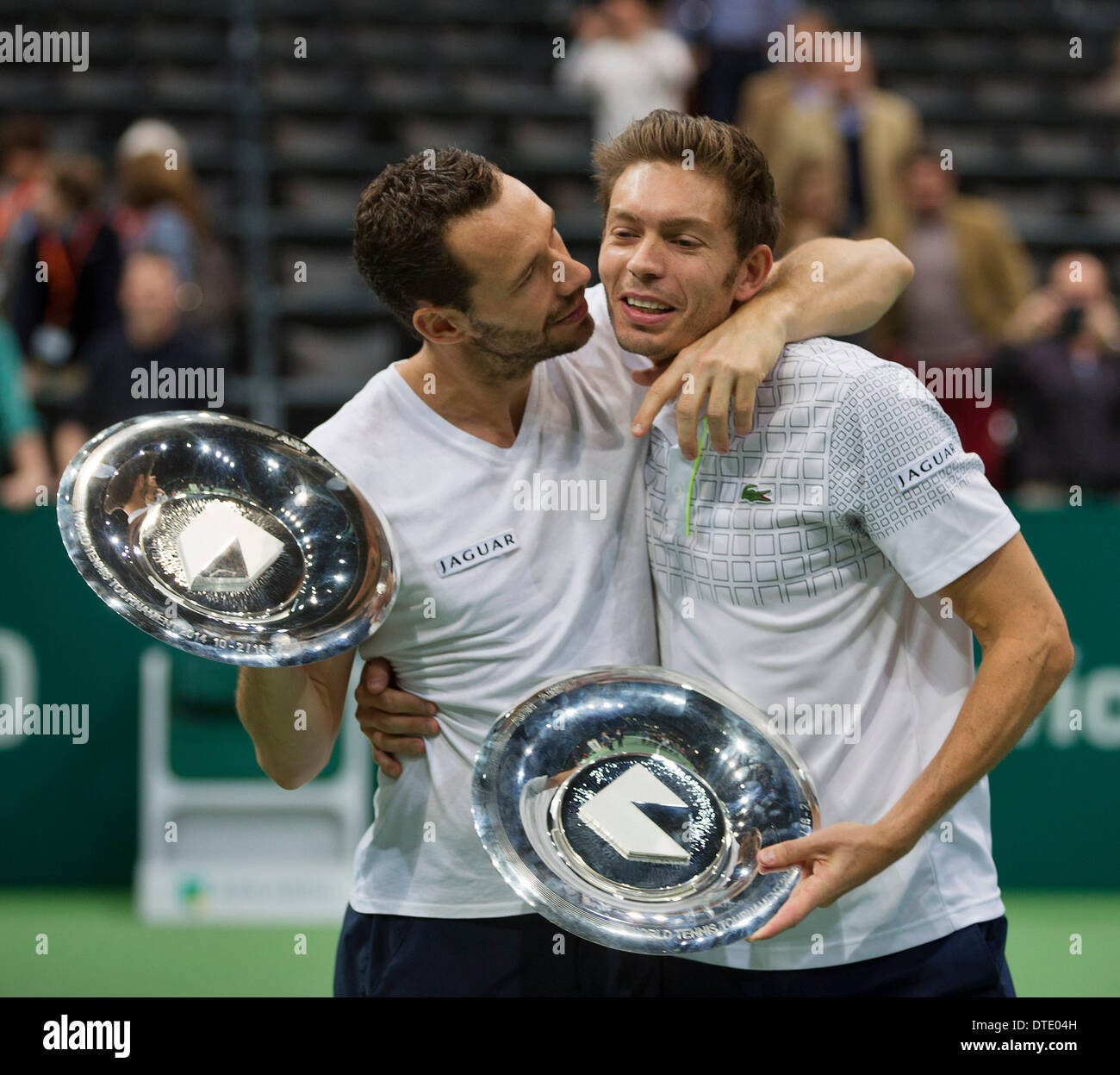 Rotterdam, aux Pays-Bas. 16.02.2014. Michael Llodra(Fra) et Nicolas Mahut(Fra) obtenir le titre gagnant pour les doubles à l'ABN AMRO World Tennis Tournament/Tennisimages:Photo Henk Koster Banque D'Images