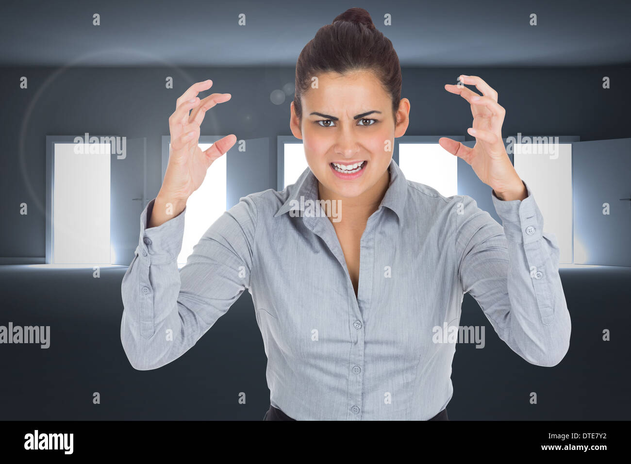 Composite image of businesswoman gesturing Banque D'Images