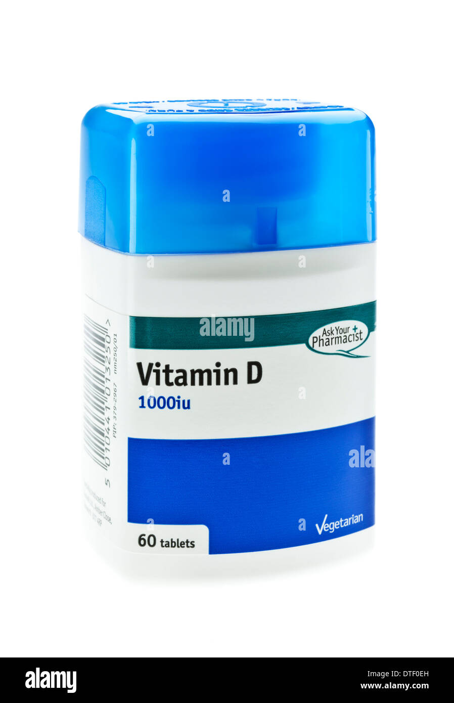 Les comprimés de vitamine D dans une bouteille sur un fond blanc Banque D'Images