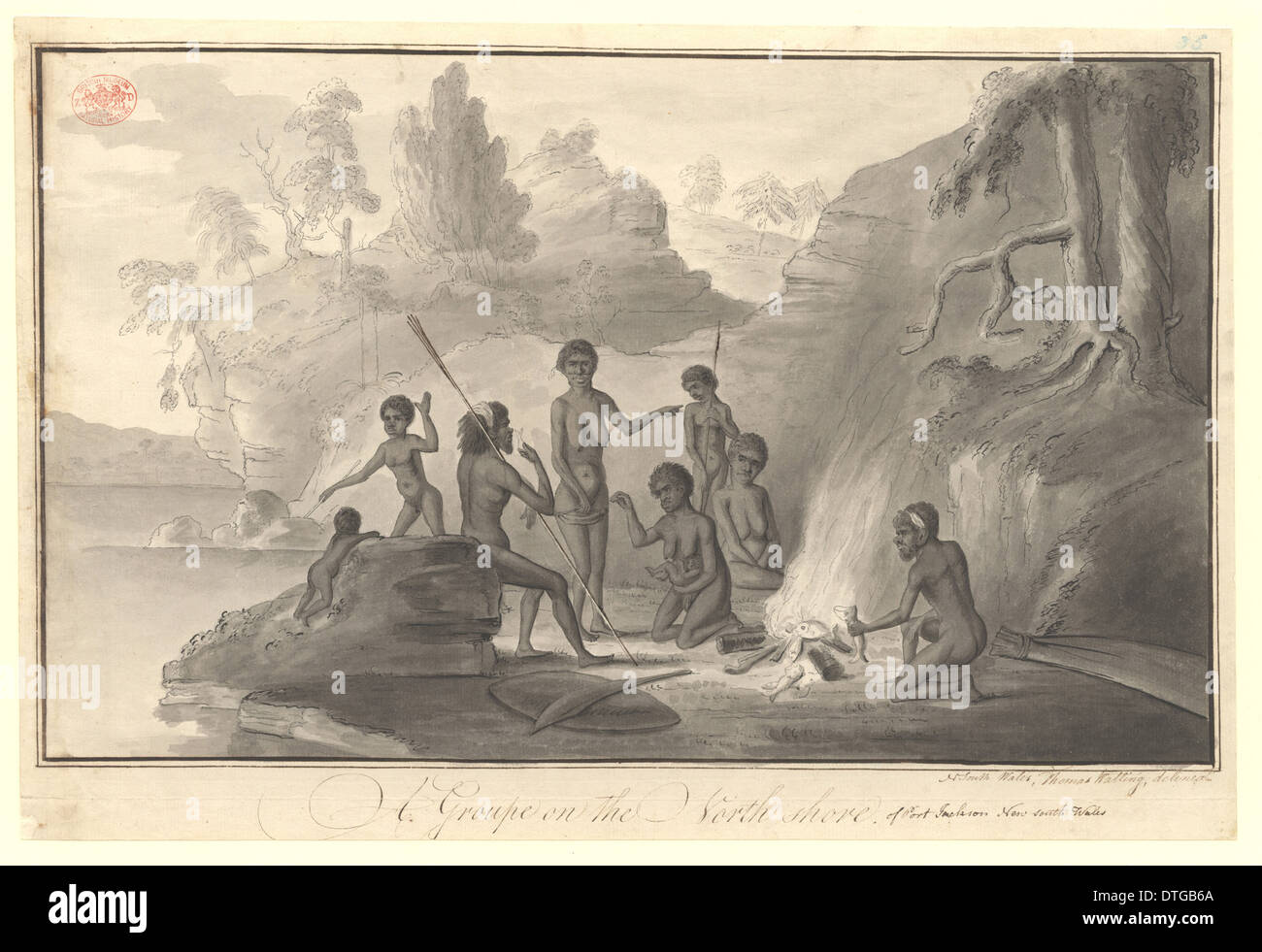 Un groupe d'Aborigènes autour d'un feu de camp Banque D'Images