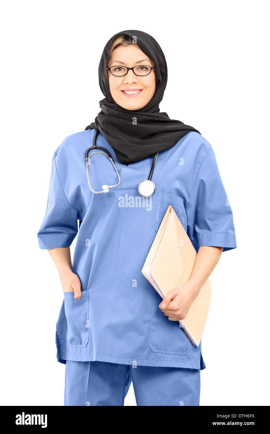Muslim female doctor holding papers Banque D'Images